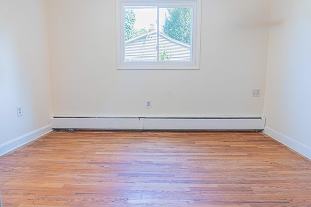 156 Overhill Dr, Berlin, CT 06037 - spare room featuring baseboard heating and light wood-style flooring