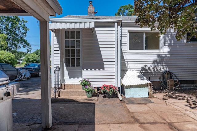 156 Overhill Dr, Berlin, CT 06037 - view of home's exterior with a chimney