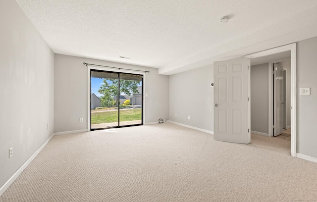 578 Pilgrim Hbr Unit 578, Wallingford, CT 06492 - empty room with light colored carpet, a textured ceiling, and a smoke detector