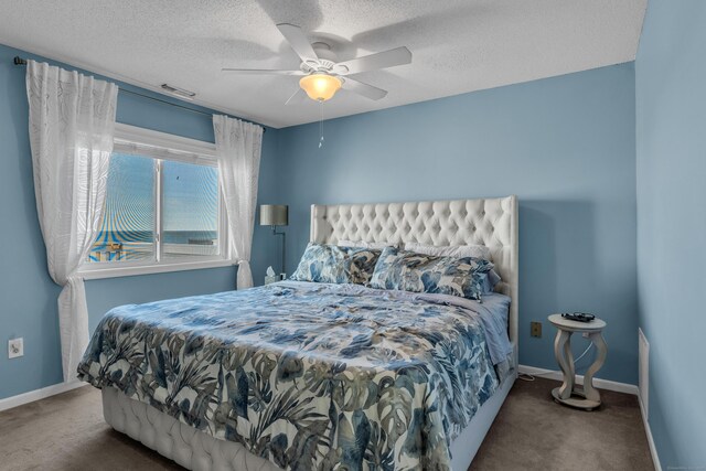 5 Mansfield Grove Rd Apt 341, East Haven, CT 06512 - carpeted bedroom featuring a textured ceiling and a ceiling fan