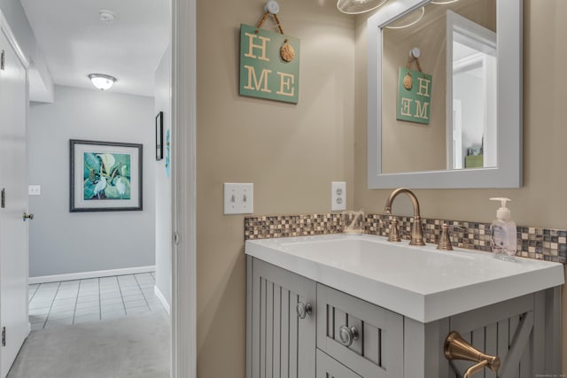 5 Mansfield Grove Rd Apt 341, East Haven, CT 06512 - bathroom featuring vanity, decorative backsplash, and tile patterned floors