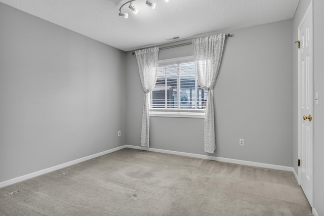 5 Mansfield Grove Rd Apt 341, East Haven, CT 06512 - spare room with carpet flooring and a textured ceiling