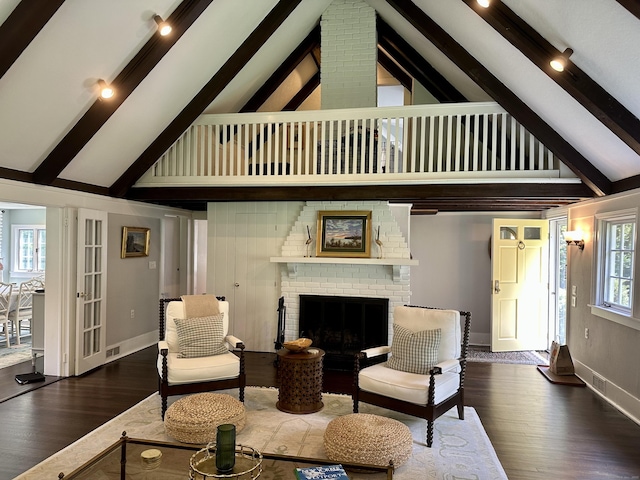 35 Rayfield Rd, Westport, CT 06880 - living area featuring high vaulted ceiling, wood finished floors, beamed ceiling, and a fireplace
