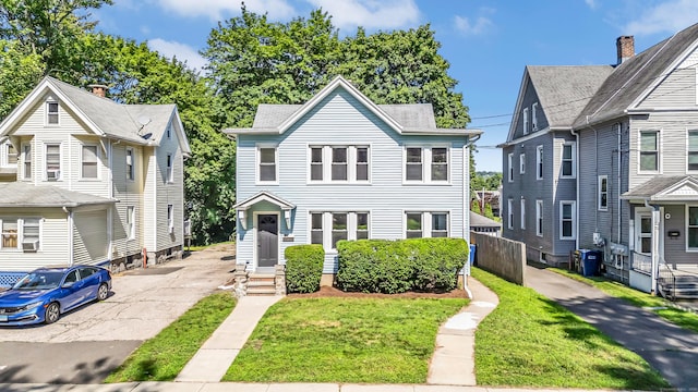 222 Wakelee Ave, Ansonia, CT 06401 - view of front of property featuring a front yard and driveway