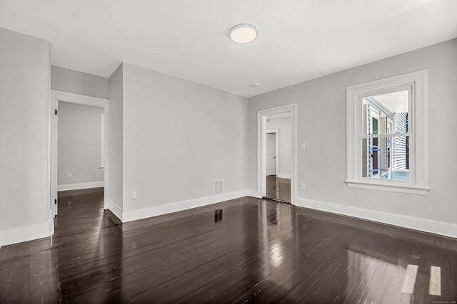 222 Wakelee Ave, Ansonia, CT 06401 - empty room featuring dark wood-type flooring and baseboards