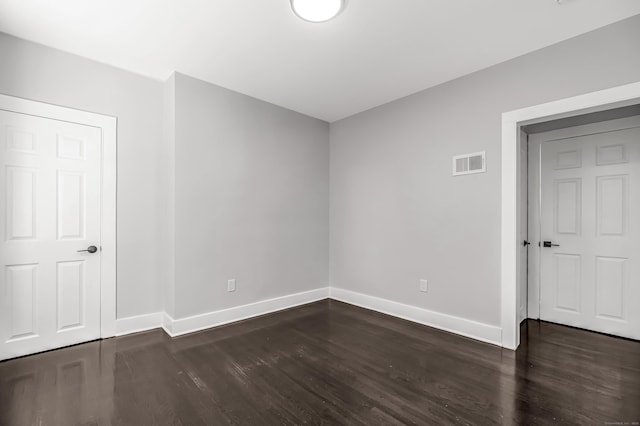 222 Wakelee Ave, Ansonia, CT 06401 - empty room featuring baseboards and dark wood-style flooring