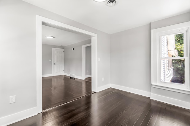 222 Wakelee Ave, Ansonia, CT 06401 - unfurnished room with dark wood-style flooring and baseboards