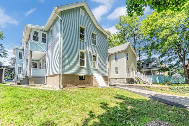 222 Wakelee Ave, Ansonia, CT 06401 - view of home's exterior with a lawn and entry steps