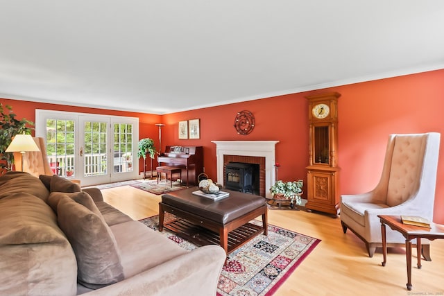 4 Adams Rd, Simsbury, CT 06089 - living room with light wood finished floors, crown molding, and a brick fireplace