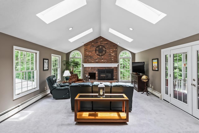 4 Adams Rd, Simsbury, CT 06089 - living area featuring a skylight, a baseboard heating unit, lofted ceiling, and healthy amount of natural light