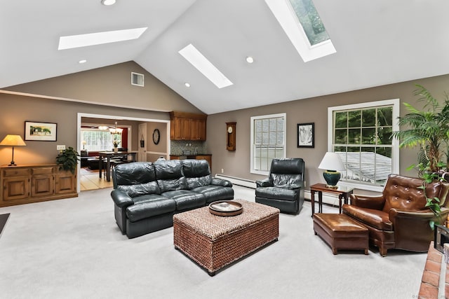 4 Adams Rd, Simsbury, CT 06089 - living room with a skylight, high vaulted ceiling, light carpet, a baseboard heating unit, and recessed lighting