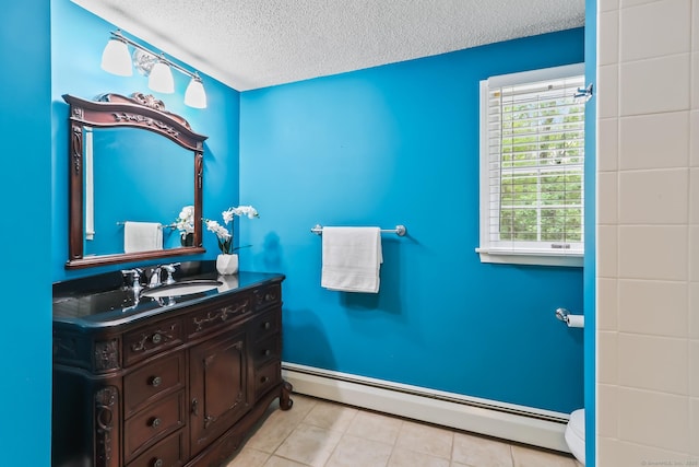 4 Adams Rd, Simsbury, CT 06089 - bathroom featuring a baseboard radiator, vanity, a textured ceiling, and tile patterned flooring