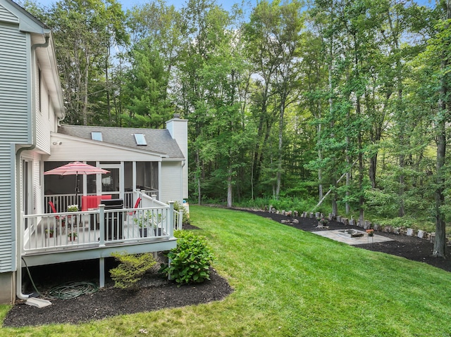 4 Adams Rd, Simsbury, CT 06089 - view of grassy yard featuring a sunroom and a deck