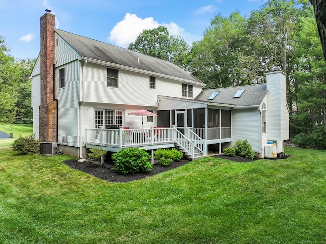 4 Adams Rd, Simsbury, CT 06089 - back of house with a chimney, a sunroom, a yard, a deck, and a shingled roof