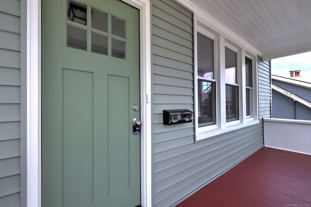 21 Orange Ter, West Haven, CT 06516 - doorway to property with covered porch