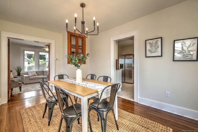 21 Orange Ter, West Haven, CT 06516 - dining room featuring dark wood-type flooring and a chandelier