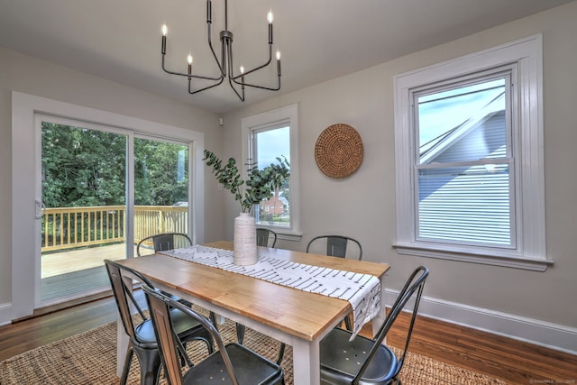 21 Orange Ter, West Haven, CT 06516 - dining room featuring a chandelier and dark wood finished floors