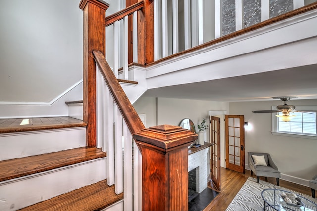 21 Orange Ter, West Haven, CT 06516 - stairway with wood finished floors and ceiling fan