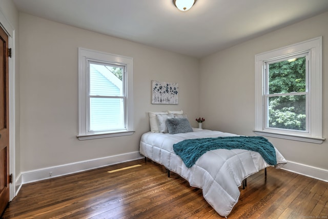 21 Orange Ter, West Haven, CT 06516 - bedroom with multiple windows and dark wood-style floors