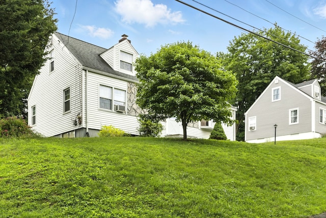 6 Topstone Dr, Danbury, CT 06810 - view of side of property featuring a chimney, a yard, and cooling unit