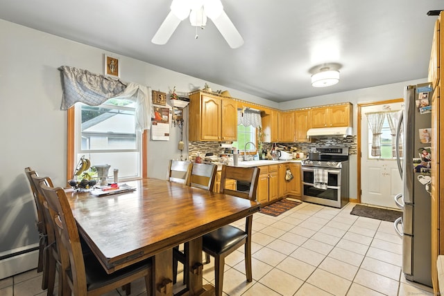 6 Topstone Dr, Danbury, CT 06810 - kitchen with appliances with stainless steel finishes, under cabinet range hood, backsplash, and light tile patterned floors