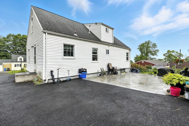 6 Topstone Dr, Danbury, CT 06810 - rear view of house featuring a patio area and a shingled roof