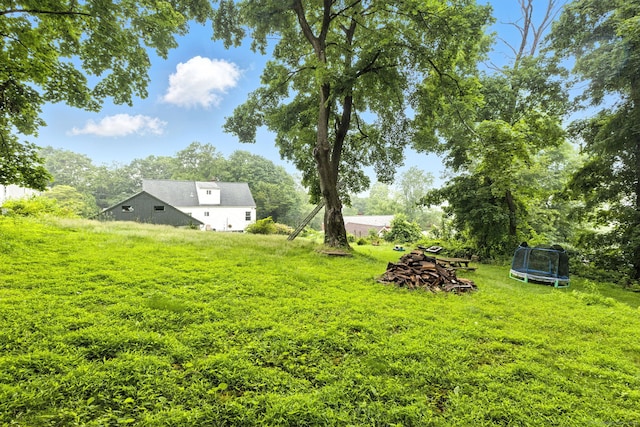 6 Topstone Dr, Danbury, CT 06810 - view of grassy yard with a trampoline