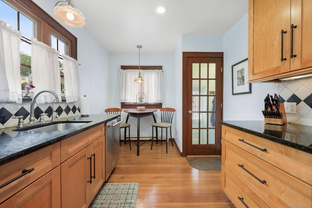 20 Cedar Crest Pl, Norwalk, CT 06854 - kitchen with dishwasher, decorative backsplash, light wood-type flooring, hanging light fixtures, and dark stone countertops