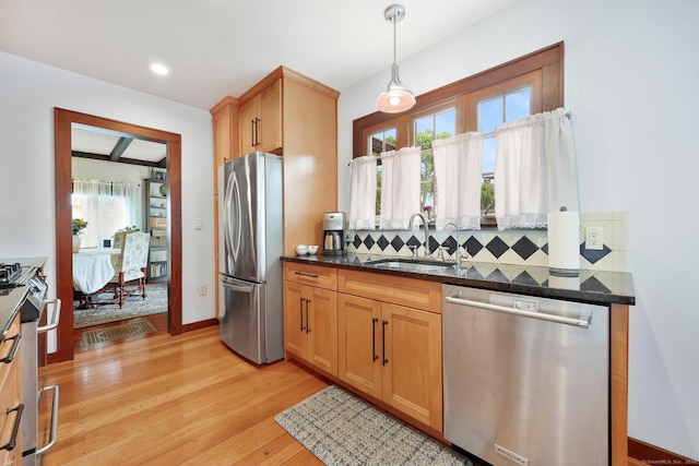 20 Cedar Crest Pl, Norwalk, CT 06854 - kitchen with appliances with stainless steel finishes, tasteful backsplash, light wood finished floors, decorative light fixtures, and recessed lighting