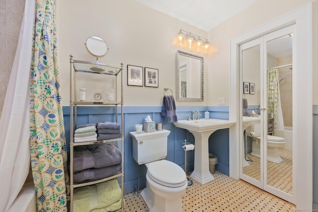 20 Cedar Crest Pl, Norwalk, CT 06854 - full bathroom with shower / tub combo and wainscoting