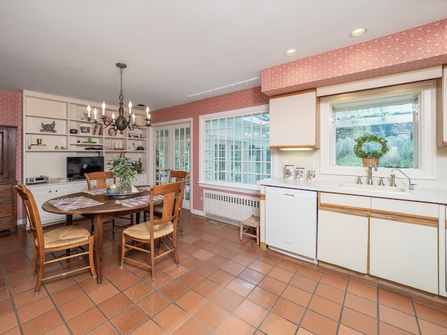 51 Powderhorn Dr, Ridgefield, CT 06877 - dining area with wallpapered walls, a chandelier, radiator heating unit, plenty of natural light, and light tile patterned flooring
