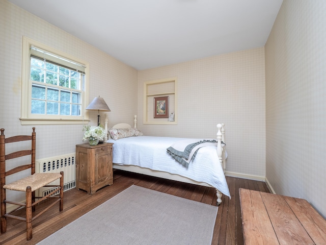 51 Powderhorn Dr, Ridgefield, CT 06877 - bedroom featuring wallpapered walls, radiator, and dark wood-style flooring