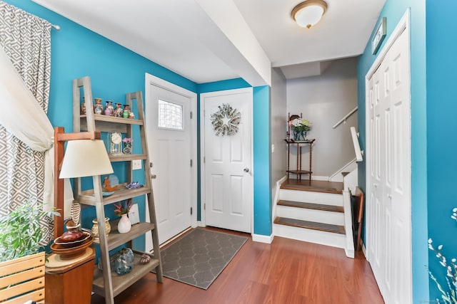 7 Pheasant Run Rd Unit 1, Kent, CT 06757 - foyer entrance featuring wood finished floors and stairs