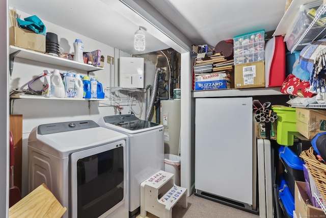 7 Pheasant Run Rd Unit 1, Kent, CT 06757 - laundry room with electric water heater, washer and dryer, and carpet floors