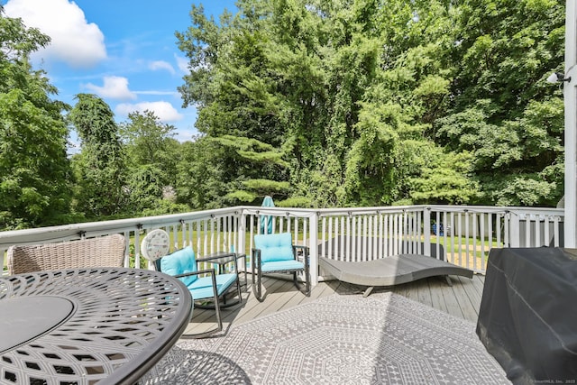 7 Pheasant Run Rd Unit 1, Kent, CT 06757 - deck featuring a grill and view of wooded area
