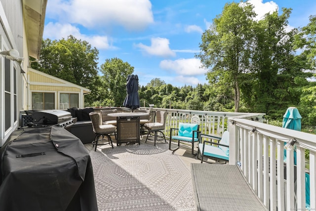 7 Pheasant Run Rd Unit 1, Kent, CT 06757 - view of patio / terrace featuring outdoor dining area, a deck, area for grilling, view of wooded area, and outdoor lounge area