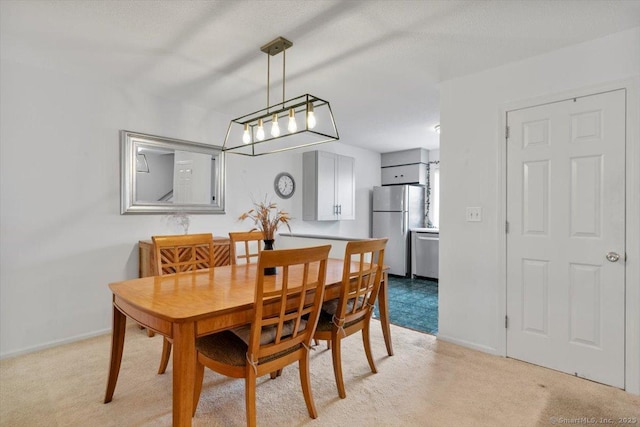 93 Cosey Beach Ave Apt 5, East Haven, CT 06512 - dining area with light colored carpet and baseboards