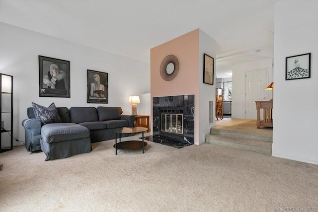 93 Cosey Beach Ave Apt 5, East Haven, CT 06512 - living room featuring carpet floors and a fireplace