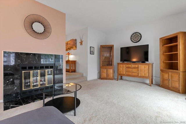 93 Cosey Beach Ave Apt 5, East Haven, CT 06512 - living room featuring carpet flooring and a premium fireplace