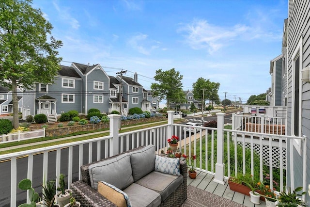93 Cosey Beach Ave Apt 5, East Haven, CT 06512 - balcony featuring a residential view and outdoor lounge area