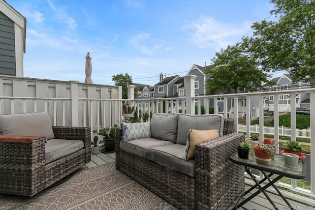 93 Cosey Beach Ave Apt 5, East Haven, CT 06512 - balcony featuring an outdoor hangout area and a residential view
