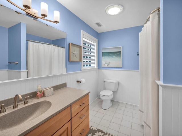 14 Ely Ln, Killingworth, CT 06419 - full bathroom with a wainscoted wall, tile patterned flooring, and vanity