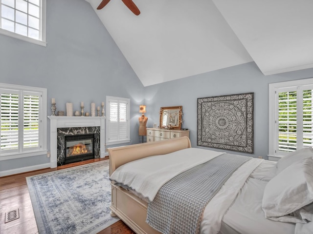 14 Ely Ln, Killingworth, CT 06419 - bedroom featuring high vaulted ceiling, multiple windows, and a high end fireplace