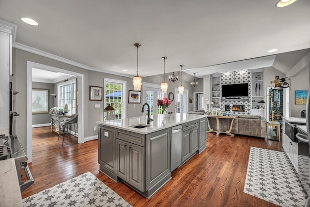 14 Ely Ln, Killingworth, CT 06419 - kitchen with gray cabinets, a lit fireplace, dark wood-type flooring, open floor plan, and stainless steel dishwasher