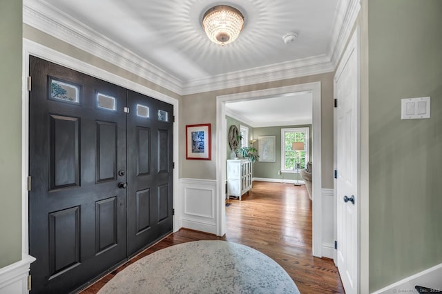 14 Ely Ln, Killingworth, CT 06419 - entrance foyer with dark wood-type flooring, wainscoting, and crown molding