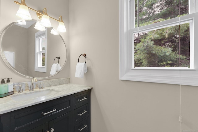 215 Georgetown Dr, Glastonbury, CT 06033 - bathroom featuring plenty of natural light and vanity