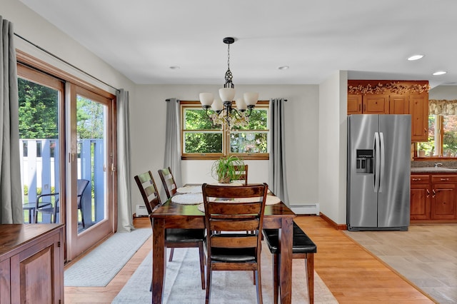 288 Pine Ln, Wethersfield, CT 06109 - dining space featuring a chandelier, a baseboard heating unit, and recessed lighting