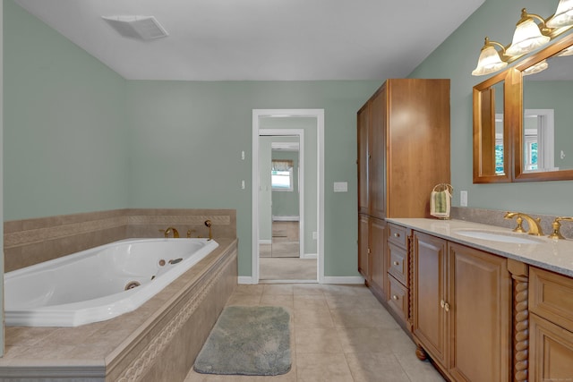 288 Pine Ln, Wethersfield, CT 06109 - full bathroom with vanity, a whirlpool tub, and tile patterned flooring