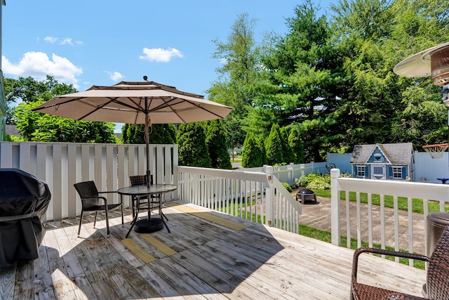 288 Pine Ln, Wethersfield, CT 06109 - wooden deck featuring an outdoor structure, outdoor dining space, and a grill