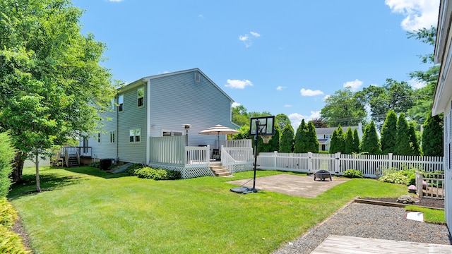 288 Pine Ln, Wethersfield, CT 06109 - back of house featuring a patio area and a deck